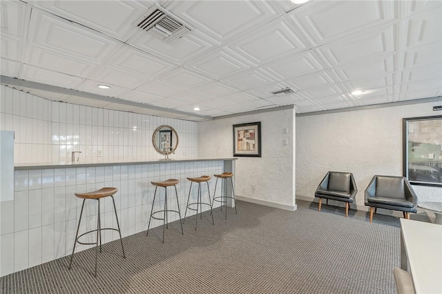 740 N Kings Rd Unit 225, West Hollywood, CA 90069 - indoor dry bar featuring a textured wall, baseboards, an ornate ceiling, recessed lighting, and carpet