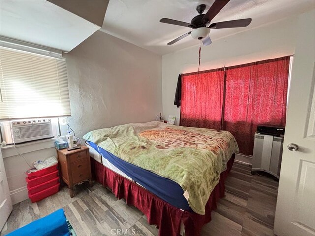3852 4th St, Riverside, CA 92501 - bedroom with ceiling fan and wood finished floors
