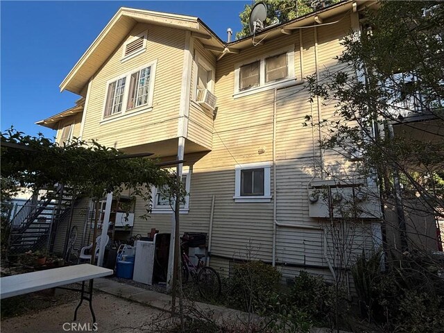 3852 4th St, Riverside, CA 92501 - rear view of house with stairs