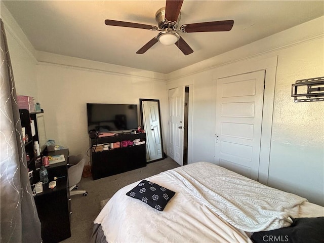 3852 4th St, Riverside, CA 92501 - bedroom featuring dark carpet and ceiling fan