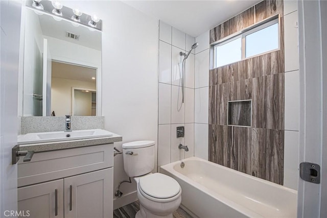 7443 Troost Ave, North Hollywood, CA 91605 - bathroom with shower / bath combination, visible vents, toilet, and vanity