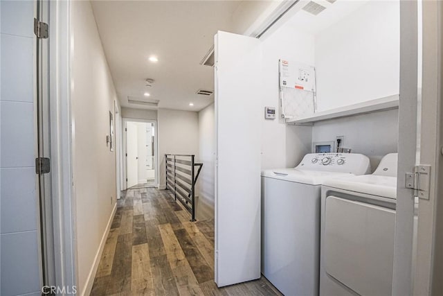 7443 Troost Ave, North Hollywood, CA 91605 - laundry room featuring wood finished floors, washer and dryer, laundry area, visible vents, and recessed lighting