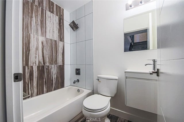 7443 Troost Ave, North Hollywood, CA 91605 - full bath featuring baseboards, washtub / shower combination, vanity, and toilet