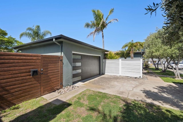 garage with fence