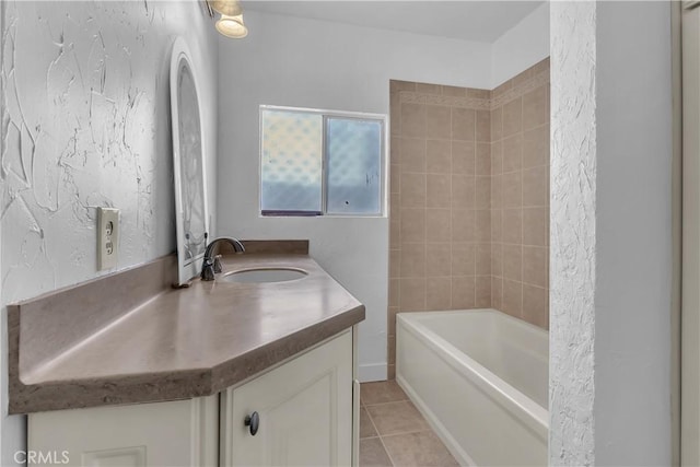 full bathroom featuring vanity and tile patterned floors
