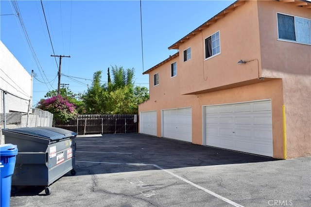 216 S Glenwood Pl, Burbank, CA 91506 - garage with driveway and fence