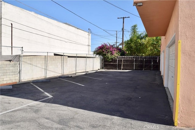 216 S Glenwood Pl, Burbank, CA 91506 - uncovered parking lot with fence