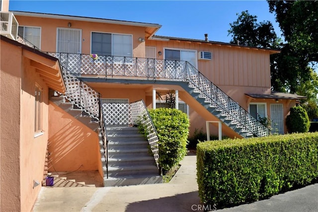 216 S Glenwood Pl, Burbank, CA 91506 - view of front of property with stairway and stucco siding