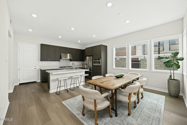 26945 Nature View Pl, Valencia, CA 91381 - dining area with dark wood-style floors, baseboards, and recessed lighting