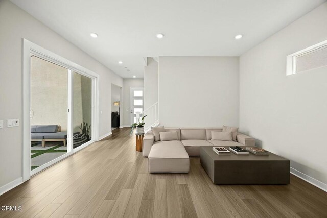 26945 Nature View Pl, Valencia, CA 91381 - living room featuring wood finished floors, baseboards, and recessed lighting