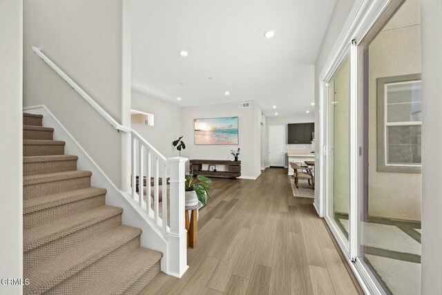 26945 Nature View Pl, Valencia, CA 91381 - foyer entrance featuring recessed lighting, light wood-style flooring, stairs, and baseboards