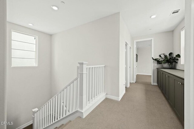 26945 Nature View Pl, Valencia, CA 91381 - corridor with an upstairs landing, light carpet, baseboards, and recessed lighting