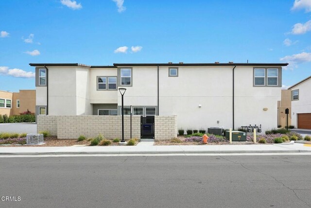 26945 Nature View Pl, Valencia, CA 91381 - view of building exterior with fence and central AC