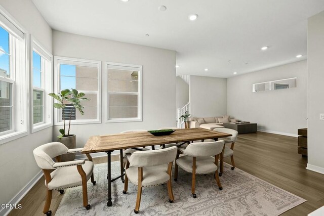26945 Nature View Pl, Valencia, CA 91381 - dining space featuring wood finished floors, stairs, baseboards, and recessed lighting