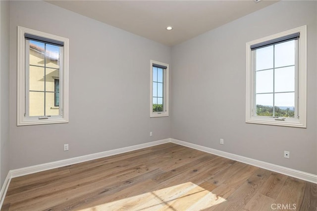 212 Clear Fls, Irvine, CA 92602 - spare room with baseboards, recessed lighting, and light wood-style floors