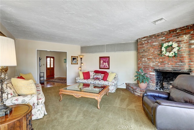 2307 Cameron Ave, Covina, CA 91724 - living room featuring carpet flooring, visible vents, and a brick fireplace