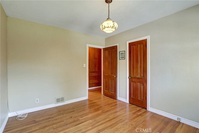 2307 Cameron Ave, Covina, CA 91724 - spare room featuring visible vents, baseboards, and a notable chandelier