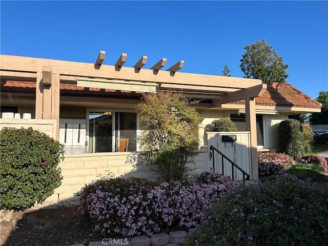 3042 Via Serena S Unit A, Laguna Woods, CA 92637 - view of side of property featuring a pergola
