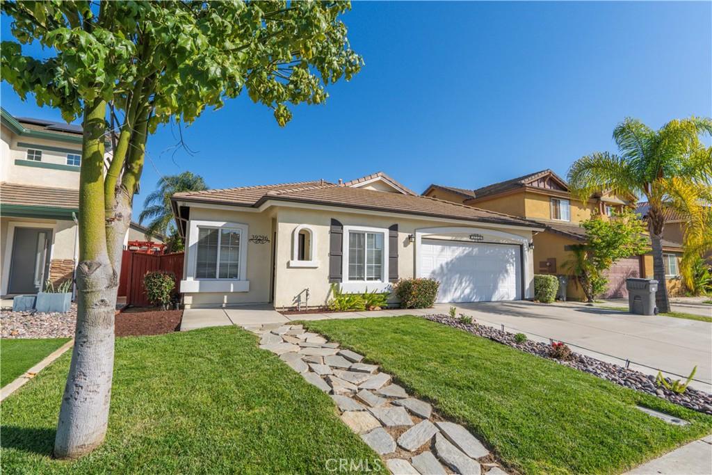 39296 Cardiff Ave, Murrieta, CA 92563 - view of front of house featuring an attached garage, driveway, a front lawn, and fence