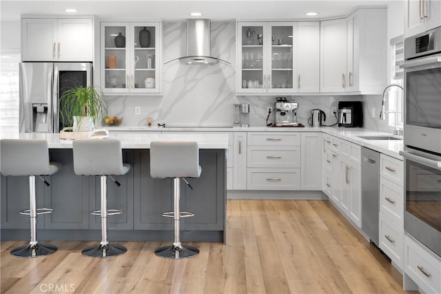 26011 Redbluff Dr, Calabasas, CA 91302 - kitchen with a sink, stainless steel appliances, wall chimney range hood, and white cabinets
