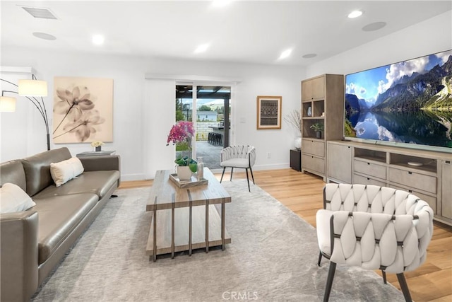 26011 Redbluff Dr, Calabasas, CA 91302 - living room featuring baseboards, light wood-type flooring, visible vents, and recessed lighting