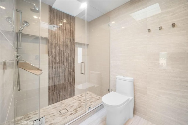 26011 Redbluff Dr, Calabasas, CA 91302 - full bath featuring tile walls, toilet, and a shower stall