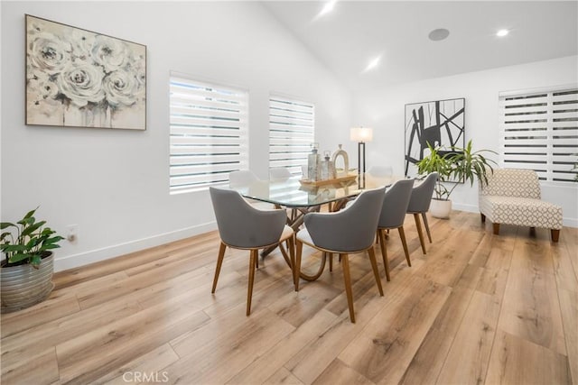 26011 Redbluff Dr, Calabasas, CA 91302 - dining space with baseboards, light wood-style flooring, recessed lighting, and high vaulted ceiling
