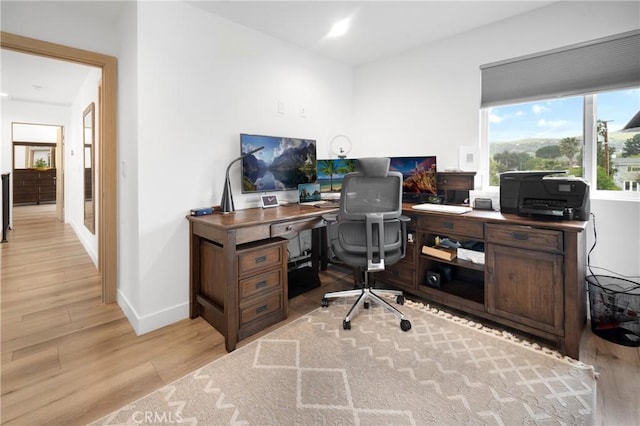 26011 Redbluff Dr, Calabasas, CA 91302 - office area featuring baseboards and light wood-style flooring