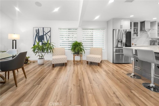 26011 Redbluff Dr, Calabasas, CA 91302 - living area with light wood-style floors, baseboards, and recessed lighting