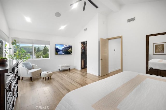 26011 Redbluff Dr, Calabasas, CA 91302 - bedroom with visible vents, high vaulted ceiling, a walk in closet, light wood-style floors, and beam ceiling