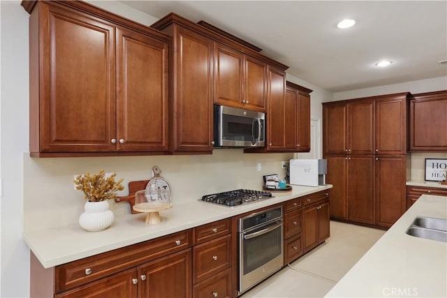 213 Wicker, Irvine, CA 92618 - kitchen with appliances with stainless steel finishes, light countertops, and recessed lighting