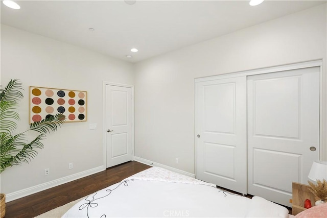 213 Wicker, Irvine, CA 92618 - bedroom featuring dark wood finished floors, baseboards, recessed lighting, and a closet