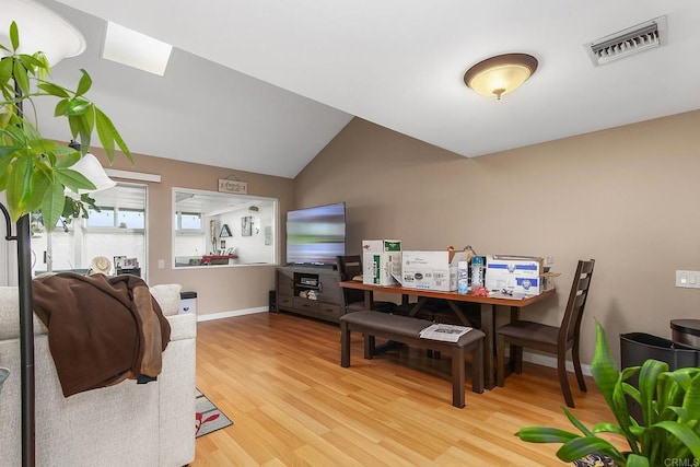 3755 Vista Campana N Unit 58, Oceanside, CA 92057 - dining space featuring light wood-style floors, baseboards, lofted ceiling, and visible vents