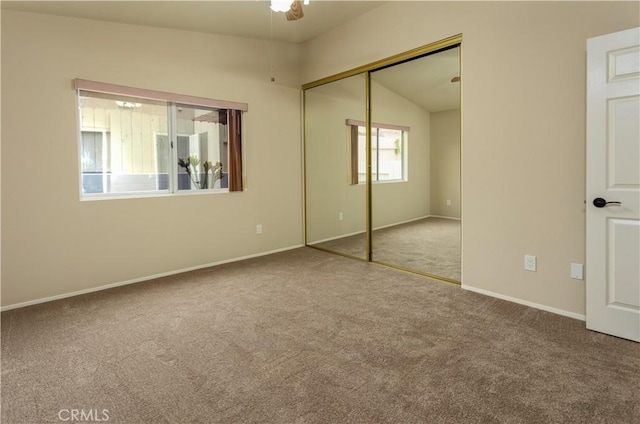 28050 Bavaria Dr, Menifee, CA 92585 - unfurnished bedroom featuring carpet, a closet, baseboards, and lofted ceiling