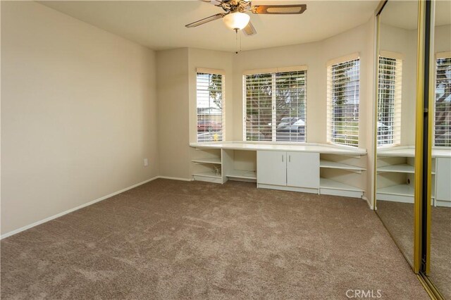 28050 Bavaria Dr, Menifee, CA 92585 - empty room featuring baseboards, a ceiling fan, and carpet floors