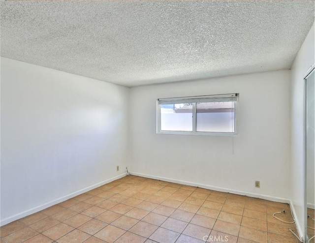 1002 Tribune St, Redlands, CA 92374 - spare room with a textured ceiling