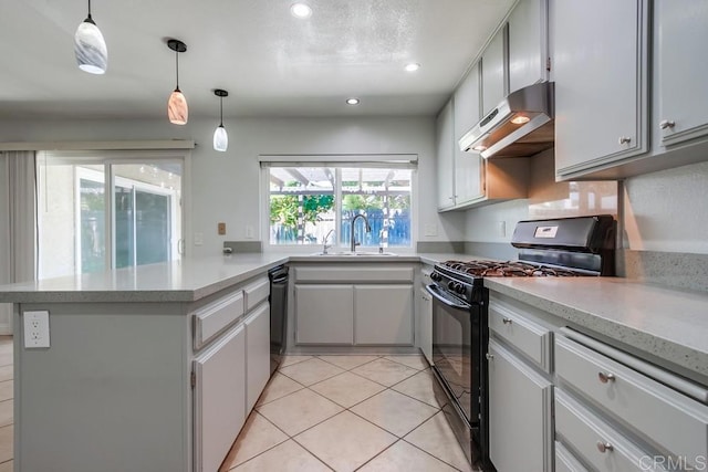 1030 Ball Ave, Escondido, CA 92026 - kitchen with black appliances, a sink, under cabinet range hood, a peninsula, and light countertops