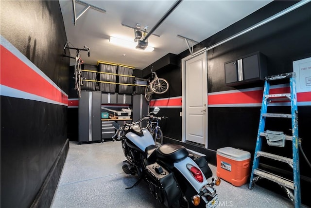 garage featuring a garage door opener