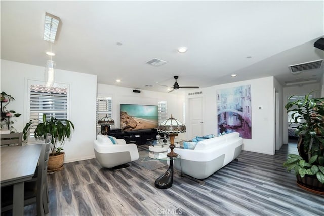 living room with recessed lighting, wood finished floors, visible vents, and a ceiling fan