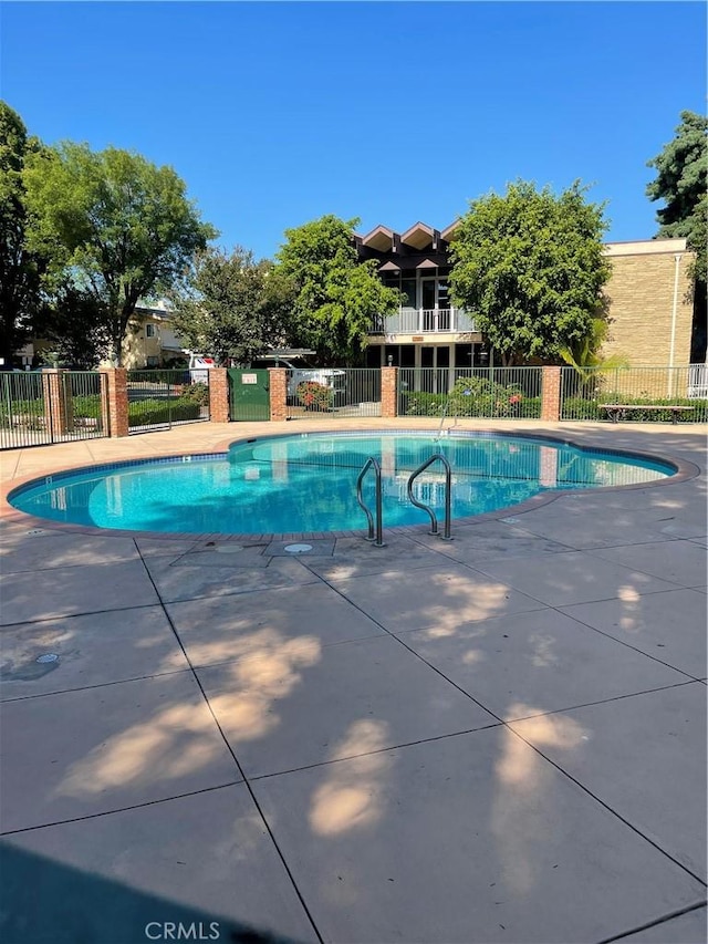 community pool with fence