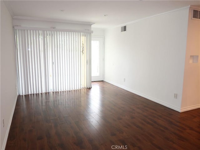 8055 Canby Ave Unit 5, Reseda, CA 91335 - empty room featuring baseboards, dark wood-style floors, and crown molding