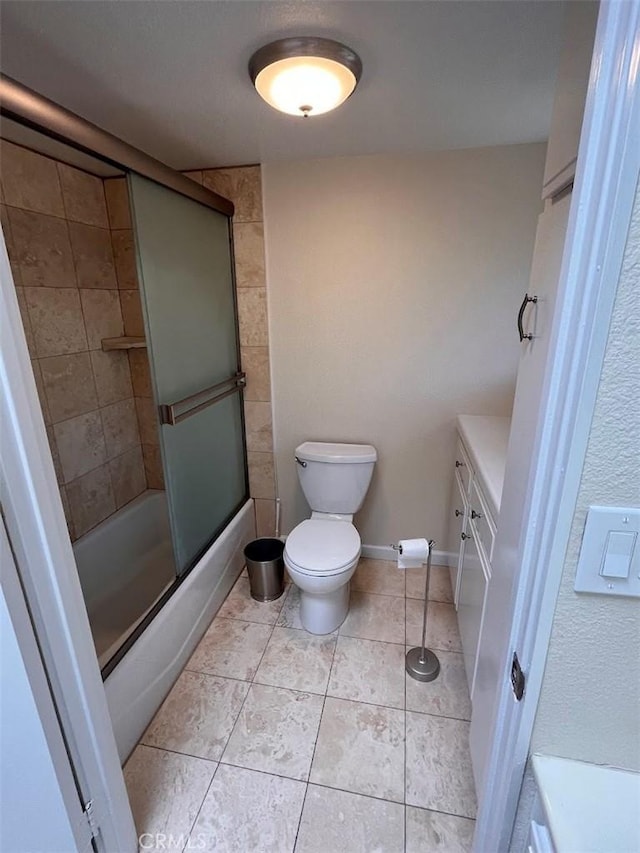 12750 Centralia St Unit 142, Lakewood, CA 90715 - full bathroom featuring tile patterned flooring, combined bath / shower with glass door, and toilet