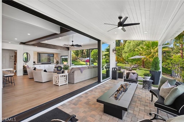 2121 Valhalla Dr, Santa Ana, CA 92705 - view of patio / terrace featuring an outdoor living space with a fire pit and ceiling fan