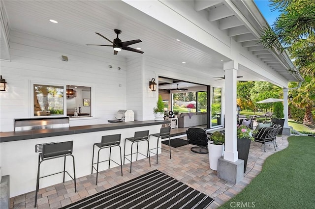 2121 Valhalla Dr, Santa Ana, CA 92705 - view of patio featuring outdoor wet bar and a ceiling fan