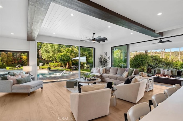 2121 Valhalla Dr, Santa Ana, CA 92705 - living area with ceiling fan, wood finished floors, and beam ceiling