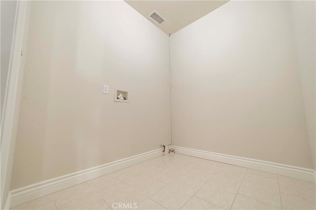 laundry area with baseboards, laundry area, hookup for a washing machine, and visible vents