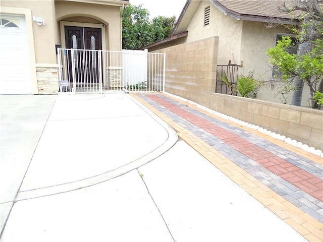 view of patio / terrace featuring fence