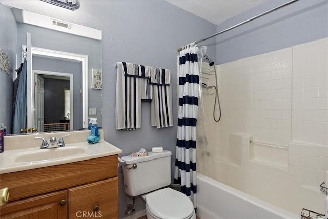 full bath with toilet, visible vents, shower / tub combo with curtain, a textured wall, and vanity