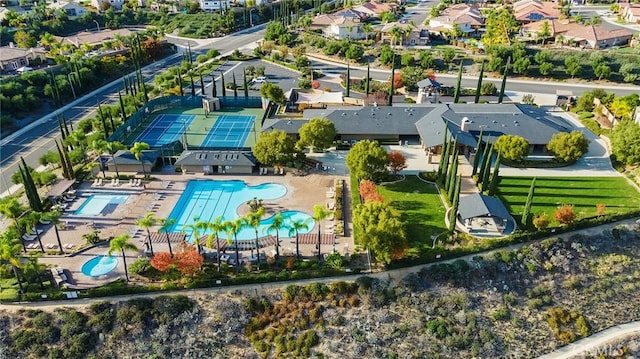 birds eye view of property with a residential view