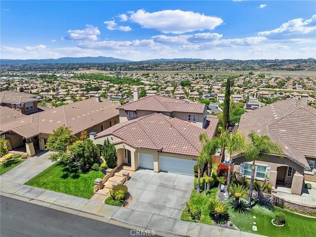 aerial view with a residential view and a mountain view